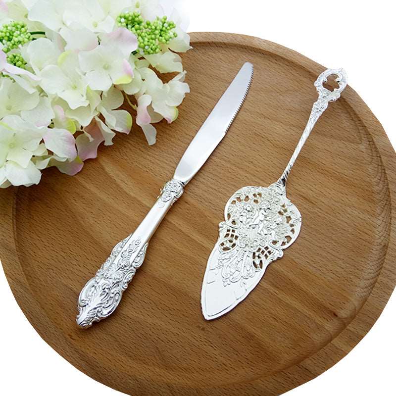 ALDO Party & Celebration > Party Supplies > Party Favors > Wedding Favors New / Stainless steel / Cake Knife cutter: 9.25 inch/ 23.5 cm Cake shovel: 8 inch/ 20.5 cm Beutiful Laxury Bride and Groom British Court Silver-Plated Cake Knife and Cake Shovel Set